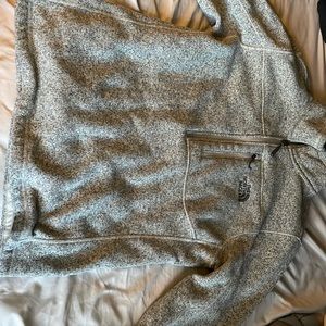 The North Face fleece jacket. 100% polyester. Men’s medium long sleeve. Gray